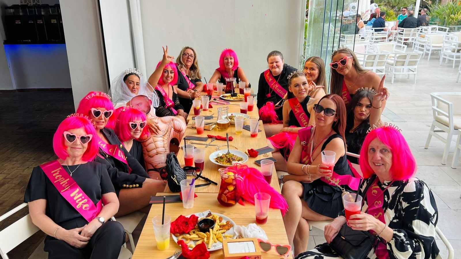 hens in pink wigs