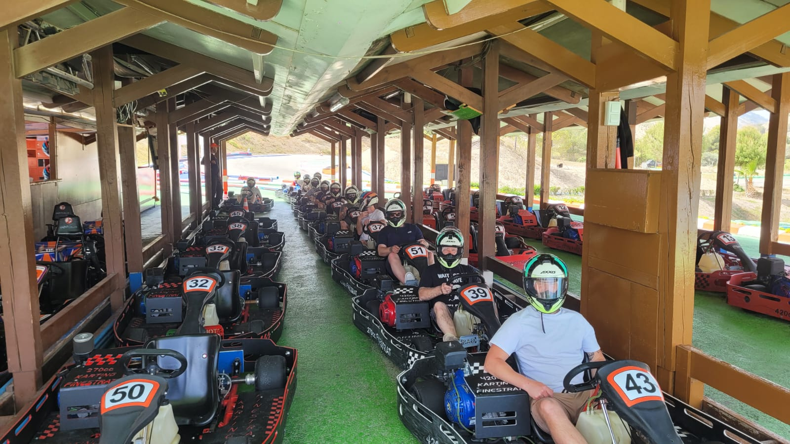 guys in karts waiting to race