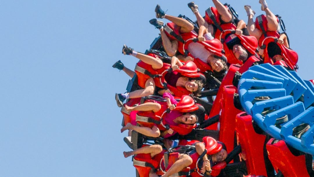 Riders upside down on a thrill ride at Terra M&iacute;tica Benidorm