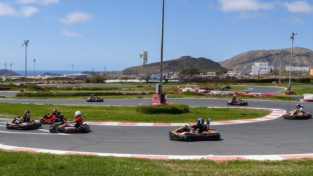 go-karts racing on a track