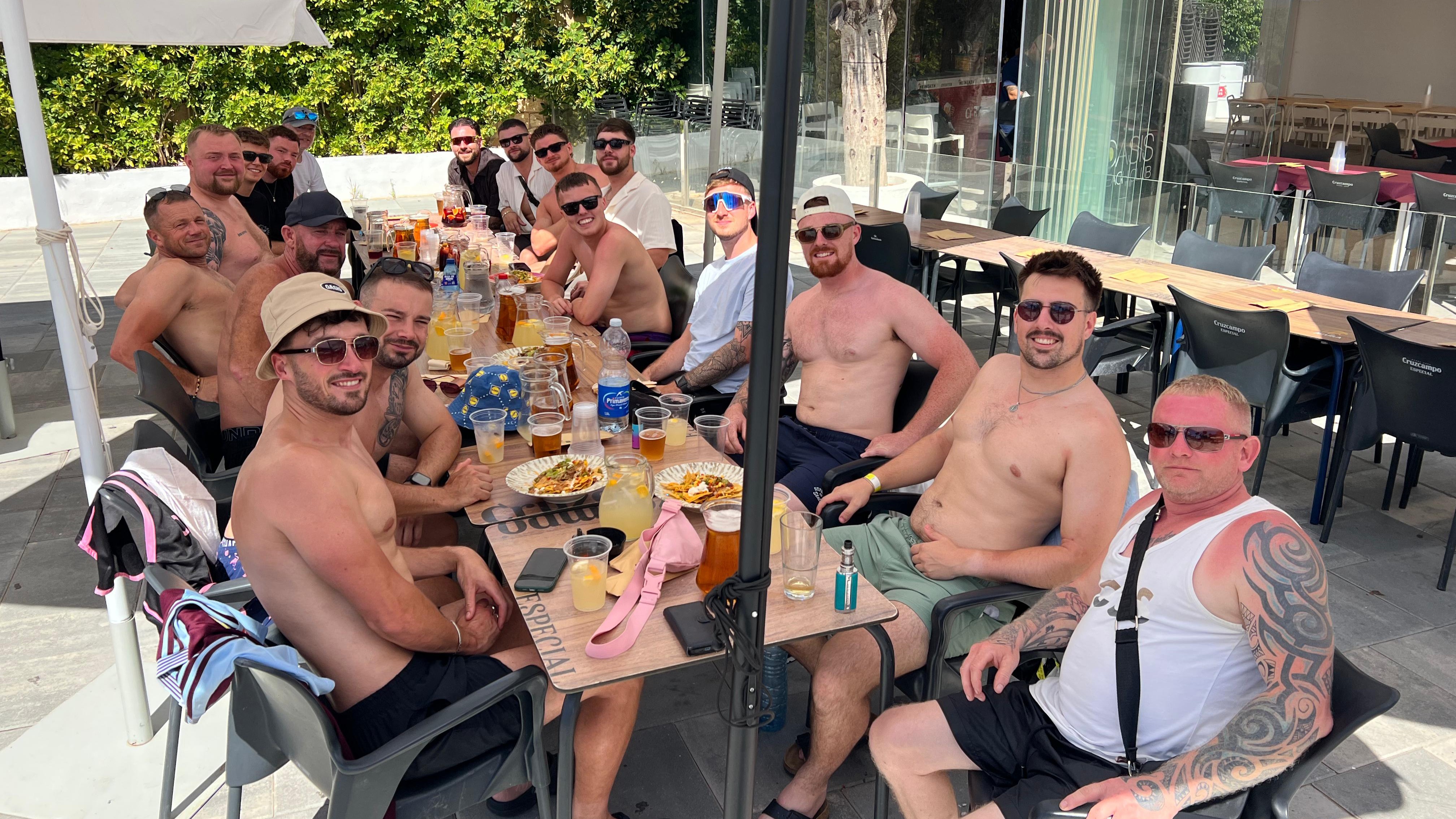 Friends sharing platters and drinks during Benidorm bottomless brunch