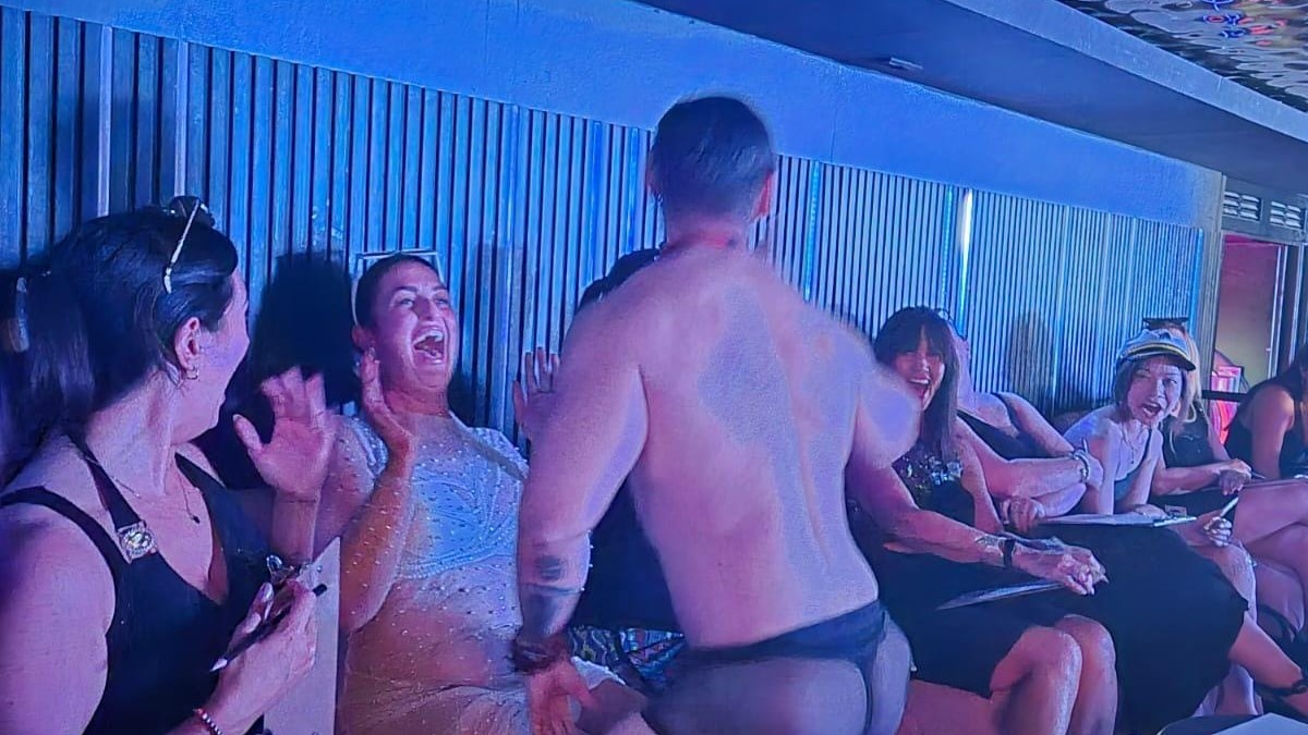 Private hen party with reserved seating and male stripper entertainment
