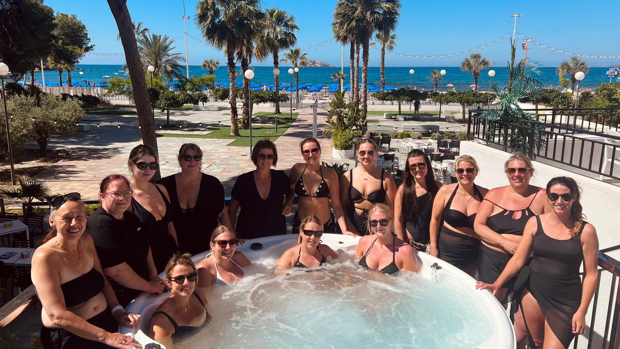 Hen group enjoying rooftop Jacuzzi in Benidorm