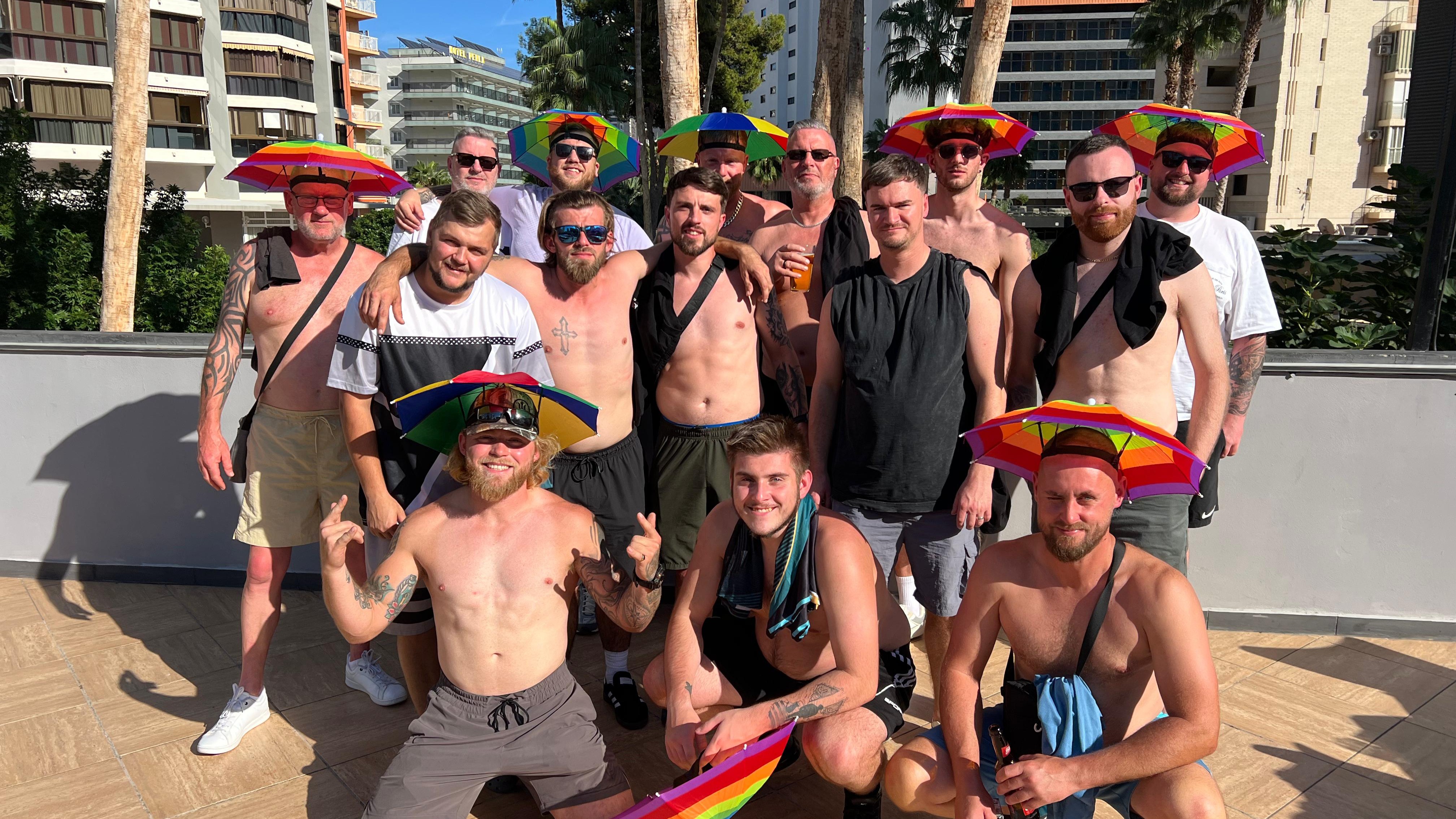 stag party with coloured umbrella hats