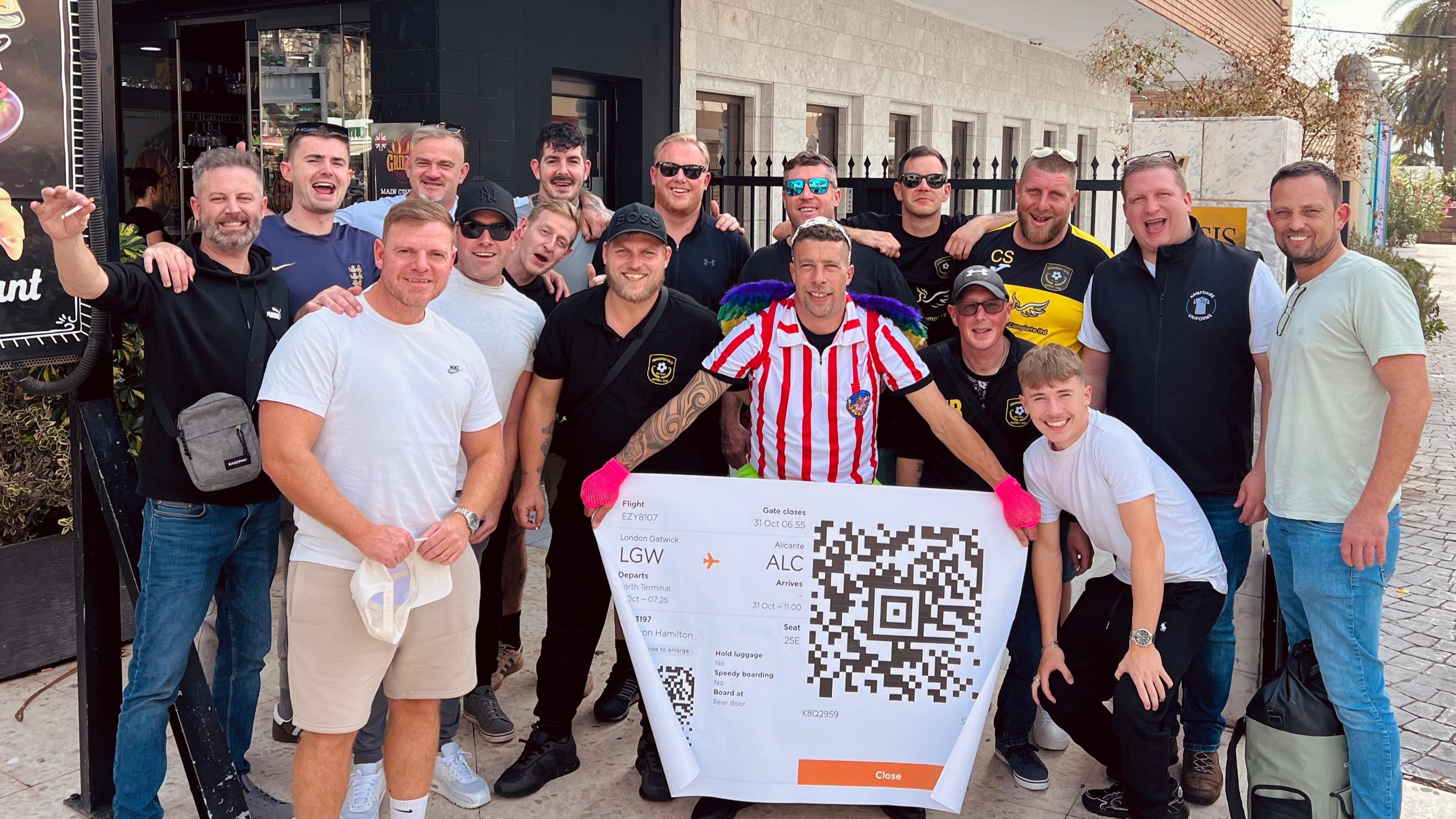 laughing stag group with over sized boarding pass